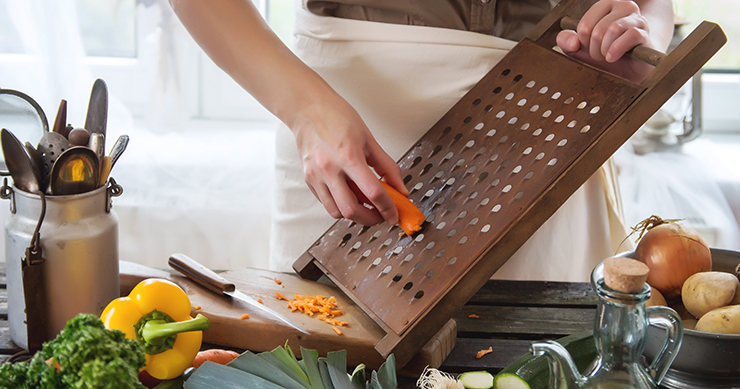 Chef grinding carrots